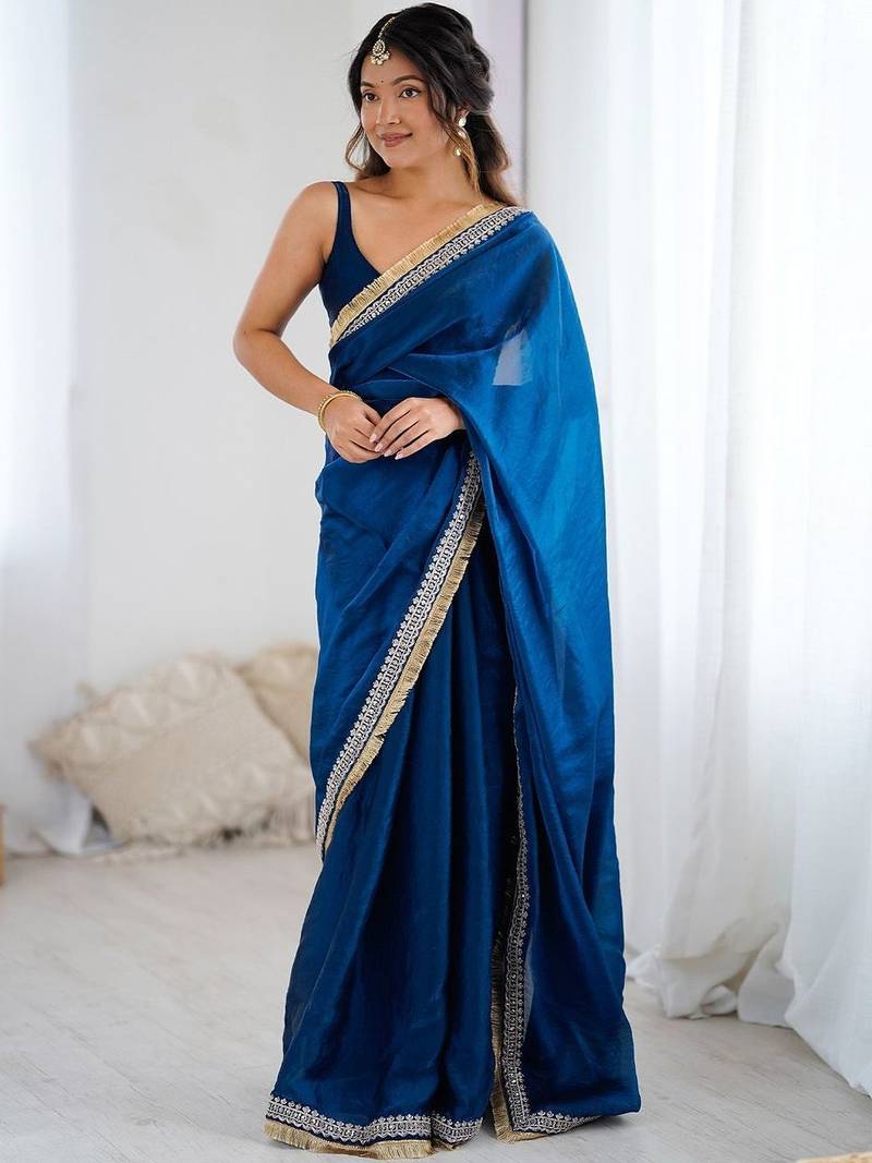 Blue ethnic motifs embroidered satin saree