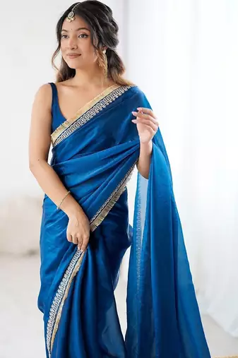 Blue ethnic motifs embroidered satin saree