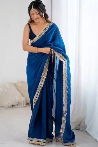 Blue ethnic motifs embroidered satin saree