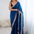 Blue ethnic motifs embroidered satin saree