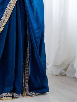 Blue ethnic motifs embroidered satin saree 4