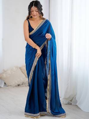 Blue ethnic motifs embroidered satin saree 5