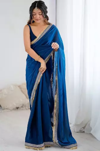 Blue ethnic motifs embroidered satin saree