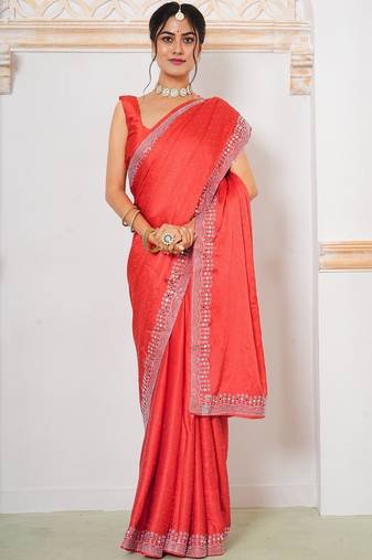 Red women embellished mirror work satin saree