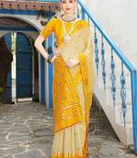 Cream cream-coloured & yellow ethnic motif woven design zari saree
