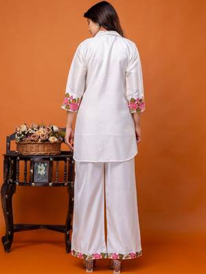 women floral embroidered regular thread work kurta with palazzos 4