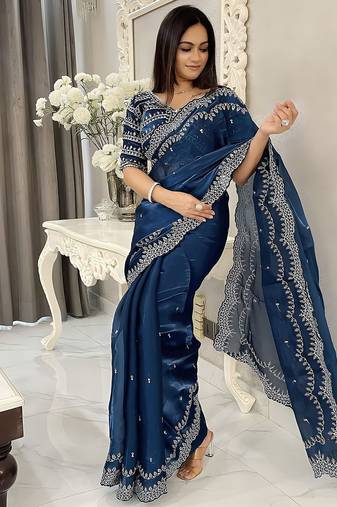 Teal women embellished beads and stones saree