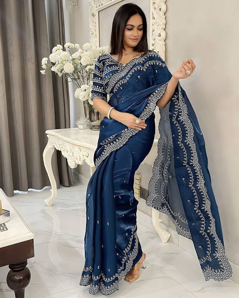 Teal women embellished beads and stones saree