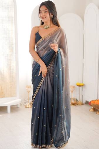 Blue embellished zari tissue heavy work saree