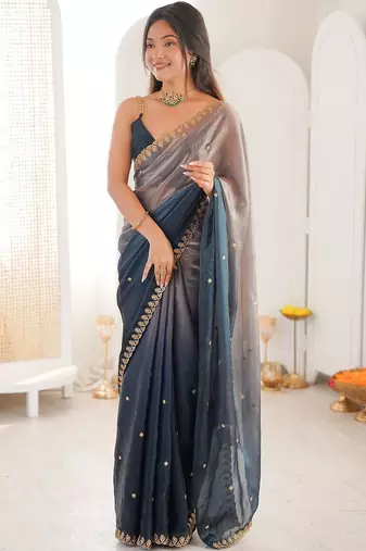 Blue embellished zari tissue heavy work saree