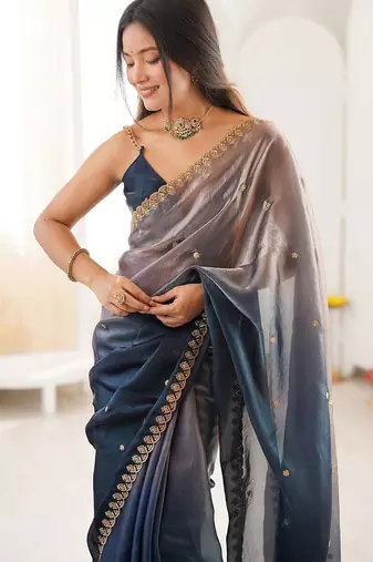 Blue embellished zari tissue heavy work saree