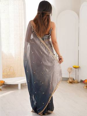 Blue embellished zari tissue heavy work saree 3