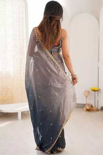 Blue embellished zari tissue heavy work saree