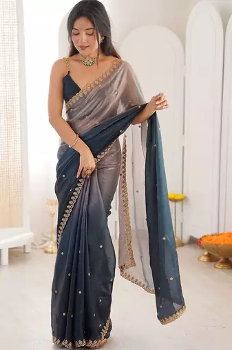 Blue embellished zari tissue heavy work saree