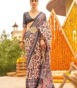 Cream ethnic motifs printed designer patola saree
