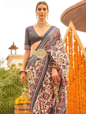 Cream ethnic motifs printed designer patola saree 2