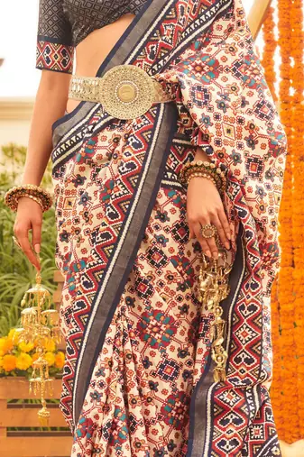 Cream ethnic motifs printed designer patola saree