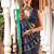 Red ethnic motifs woven design zari ikat saree