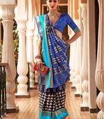 Navy blue navy blue & gold-toned ethnic motifs woven design zari ikat saree