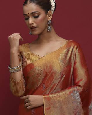 Orange woven design zari banarasi saree 1