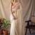 Off white checked woven design zari silk blend saree with blouse