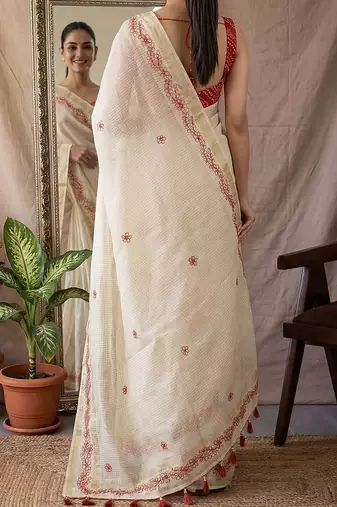 Off white checked woven design zari silk blend saree with blouse