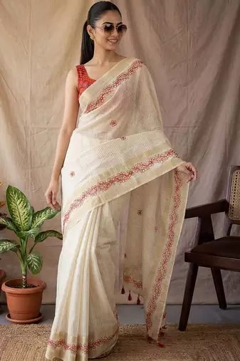 Off white checked woven design zari silk blend saree with blouse