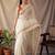 Off white checked woven design zari silk blend saree with blouse
