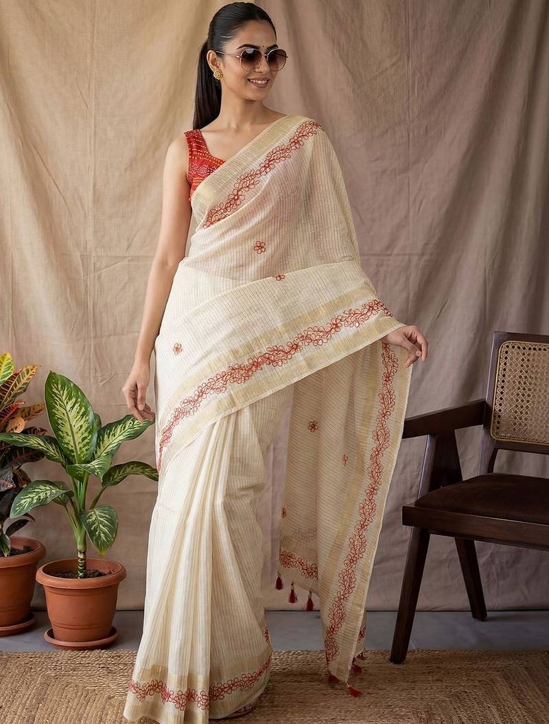 Off white checked woven design zari silk blend saree with blouse