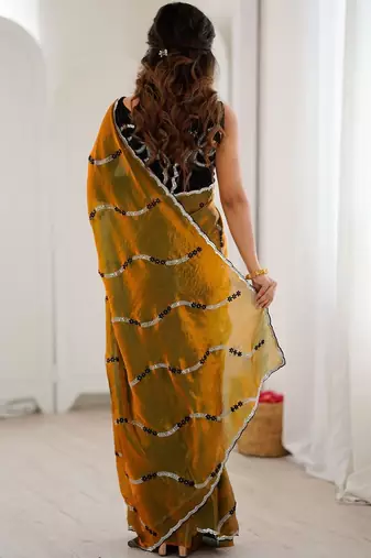 Gold embellished embroidered satin saree