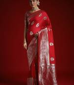 Red ethnic motifs satin banarasi saree with blouse piece