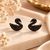 Pave crystal setting, swan silhouette design, stud back closure, women's fashion, black finish