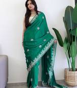 Green embroidered beads and stones saree