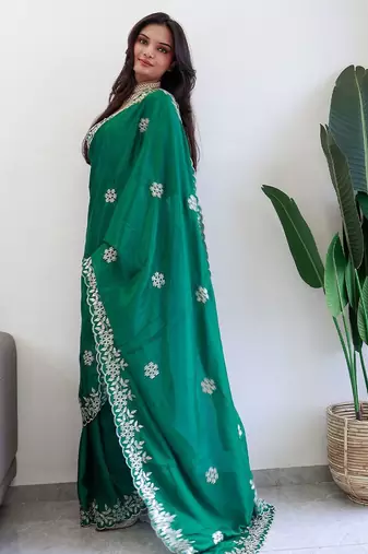 Green embroidered beads and stones saree