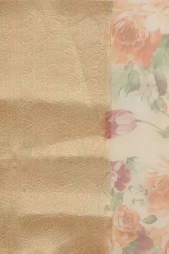 Cream cream colored & orange floral print organza saree