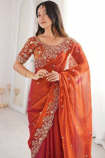 Rust ethnic motifs embroidered satin heavy work saree