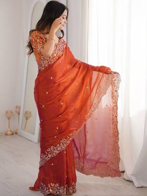 Rust ethnic motifs embroidered satin heavy work saree 4