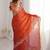 Rust ethnic motifs embroidered satin heavy work saree