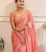Peach embellished embroidered satin saree