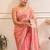 Peach embellished embroidered satin saree