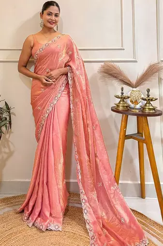 Peach embellished embroidered satin saree