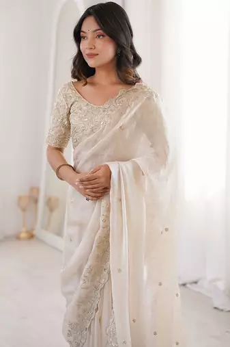 Off white embellished zari satin heavy work saree