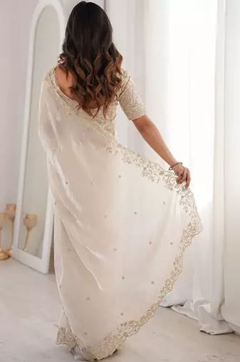 Off white embellished zari satin heavy work saree