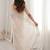 Off white embellished zari satin heavy work saree