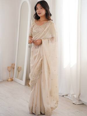 Off white embellished zari satin heavy work saree 4
