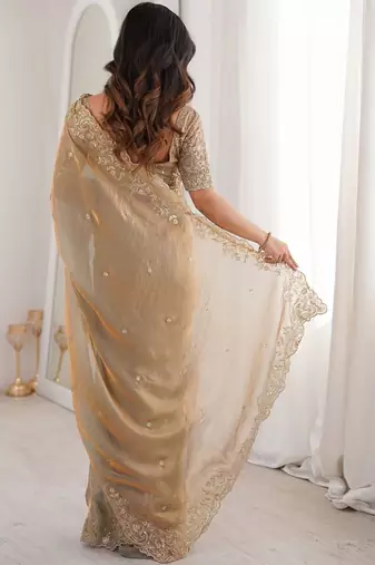 Gold embellished embroidered satin heavy work saree