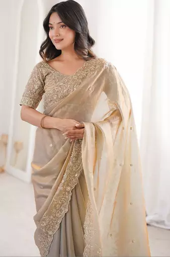 Gold embellished embroidered satin heavy work saree