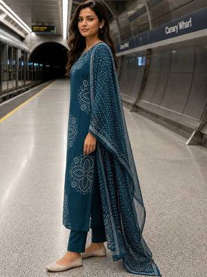 women printed regular  cotton kurta with trousers & with dupatta 4