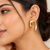 Gold-toned abstract arch stud earrings, anti-tarnish