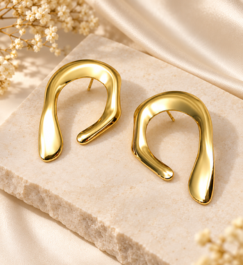 Gold-toned abstract arch stud earrings, anti-tarnish 2
